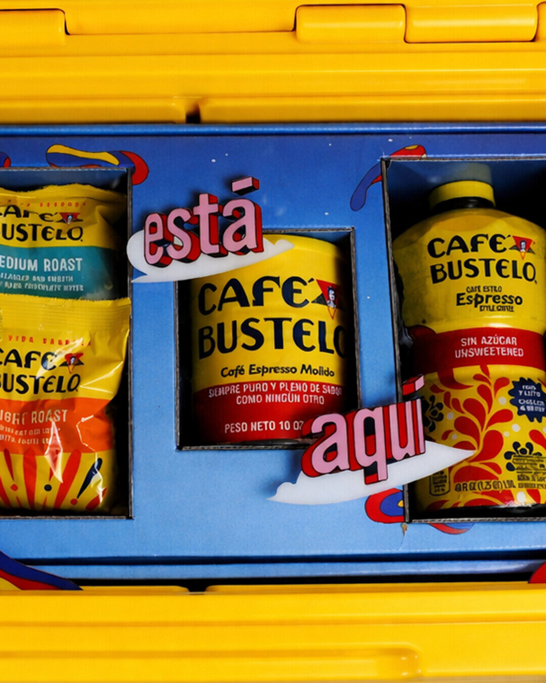 Close view of Café Bustelo coffee products organized in blue mailer compartments