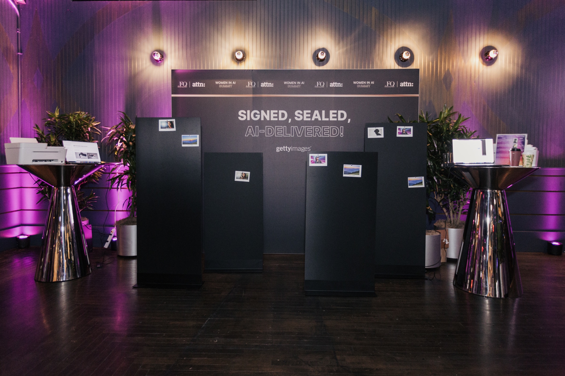 Signed, Sealed, AI Delivered partner activation wall with printed postcards