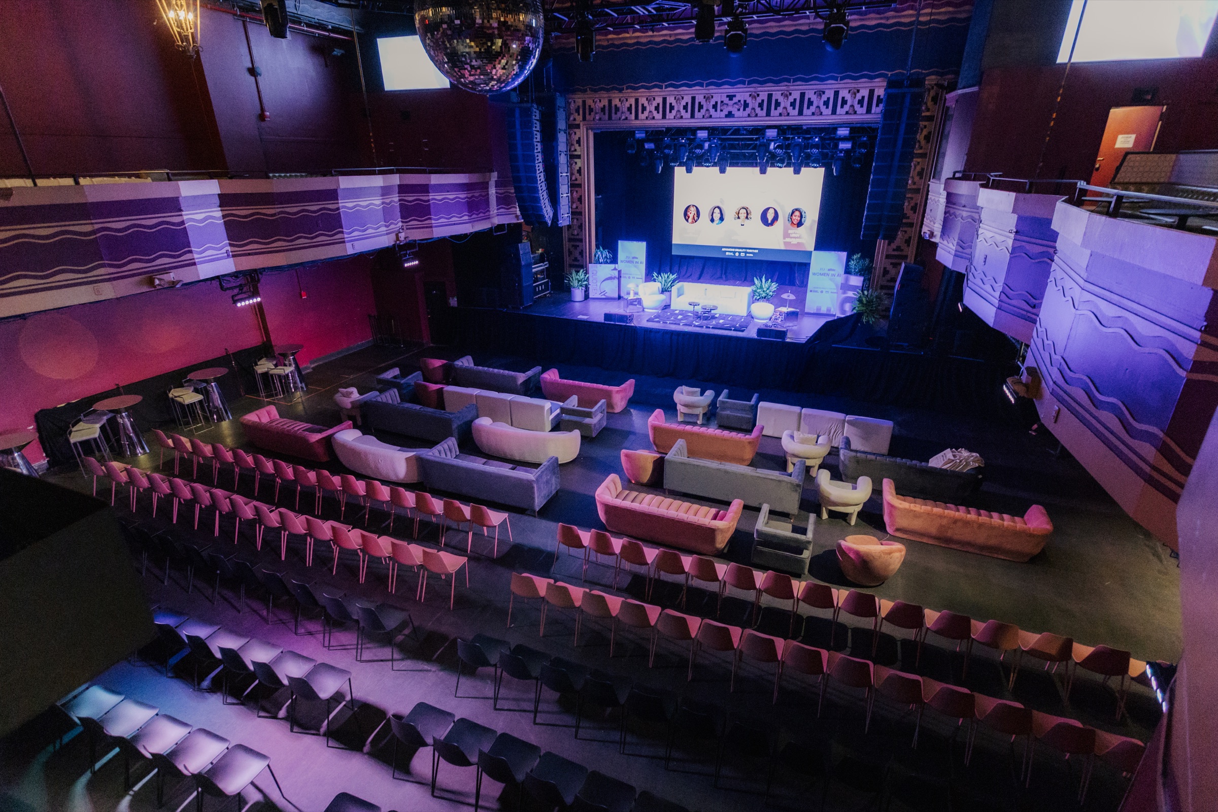 Webster Hall transformed with rose seating, greenery and the Women in AI Summit stage