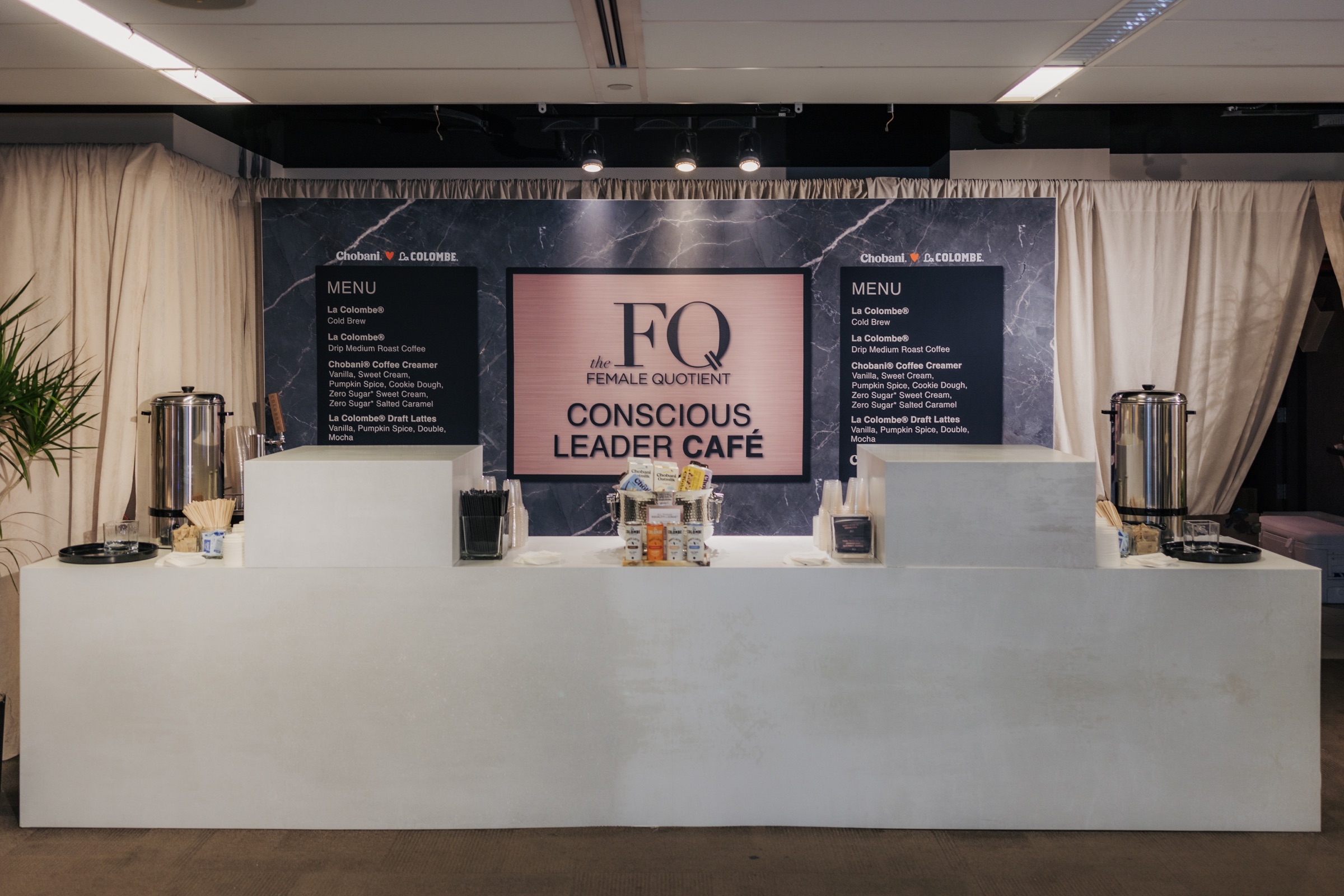 The Female Quotient Conscious Leader Café with branded menus and coffee service