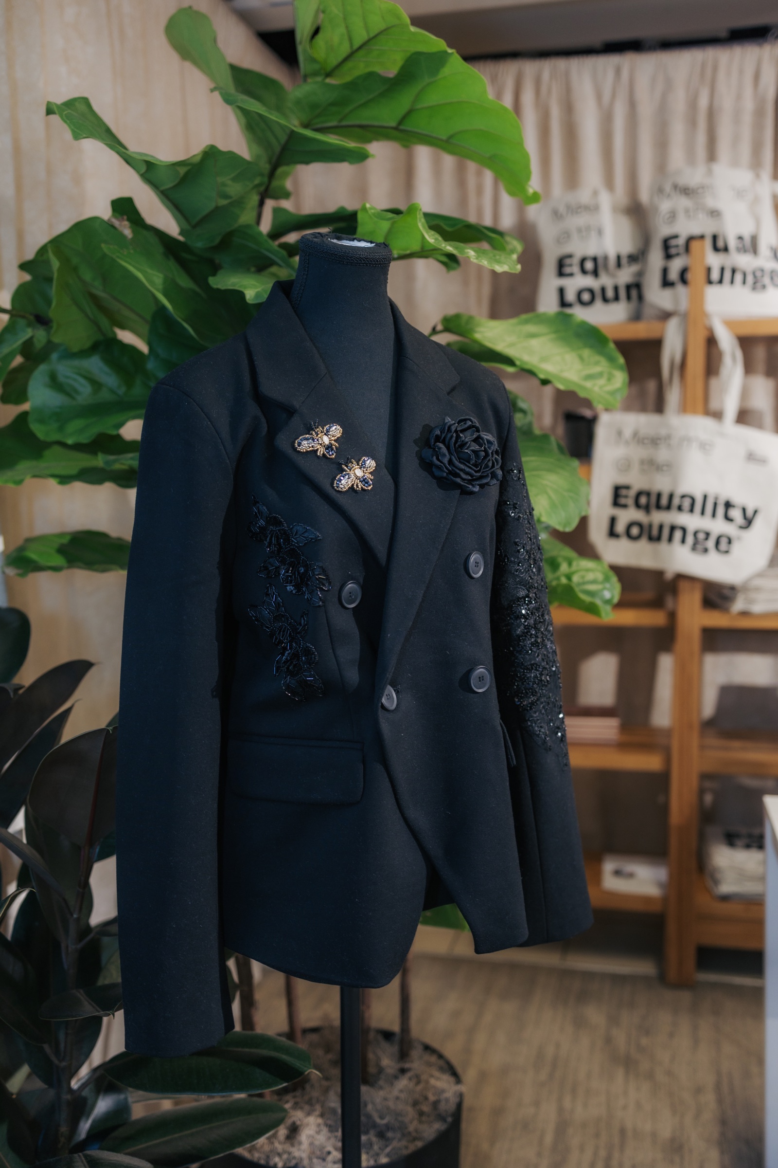 Customized blazer displayed on a mannequin