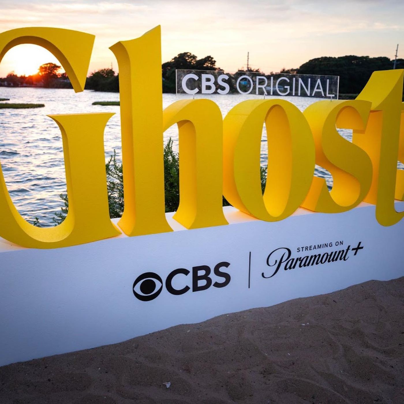 Giant CBS Original Ghosts dimensional letters on the sand at sunset