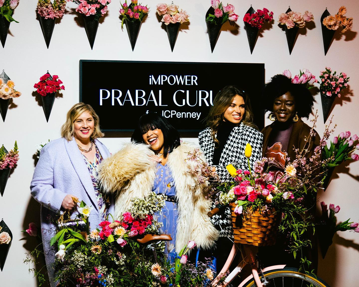 Guests gathered at the JCPenney x Prabal Gurung flower wall