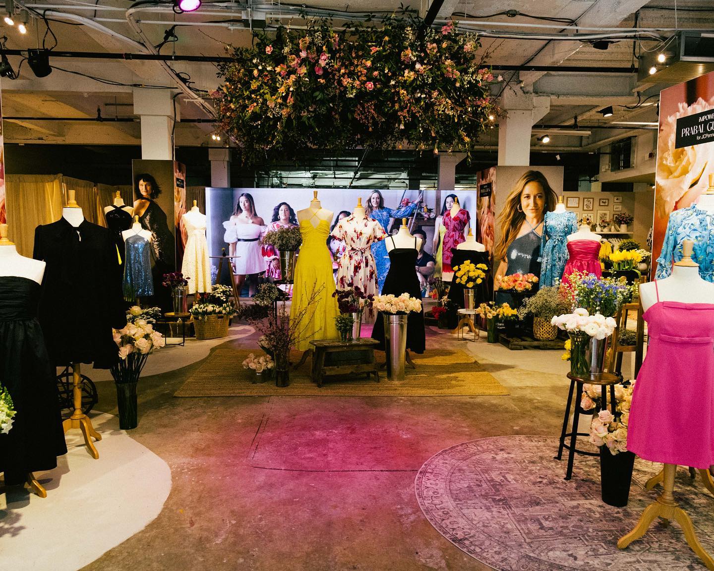 JCPenney x Prabal Gurung spring collection displayed among flowers in the Project Bloom pop-up