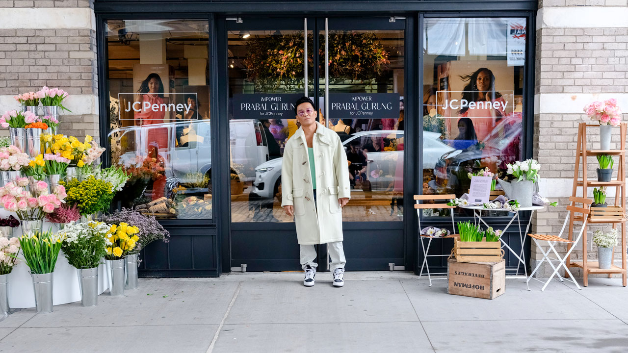 Prabal Gurung standing outside the flower-market-inspired JCPenney storefront