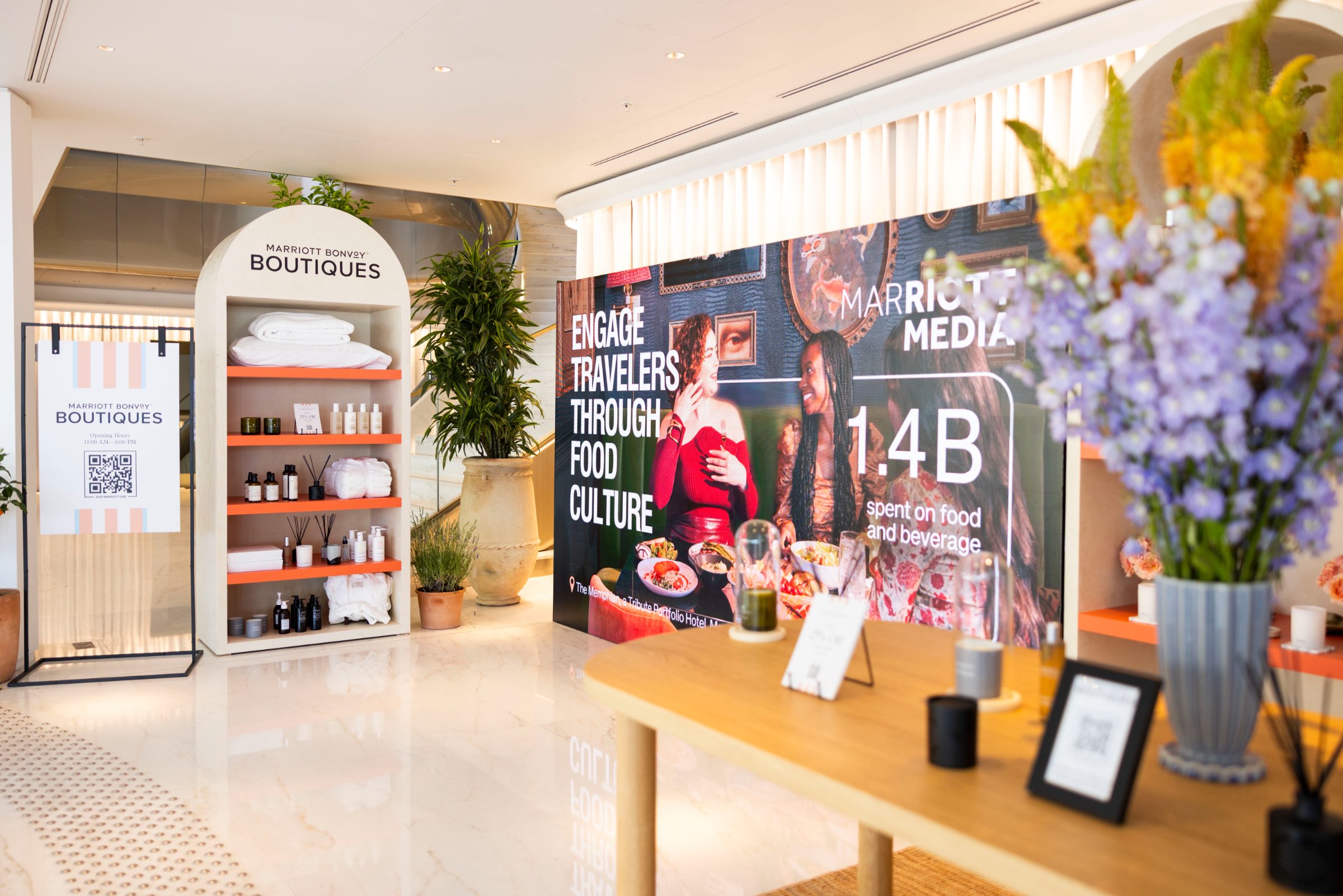 The Boutiques floor with displays beside the Marriott Media food culture wall
