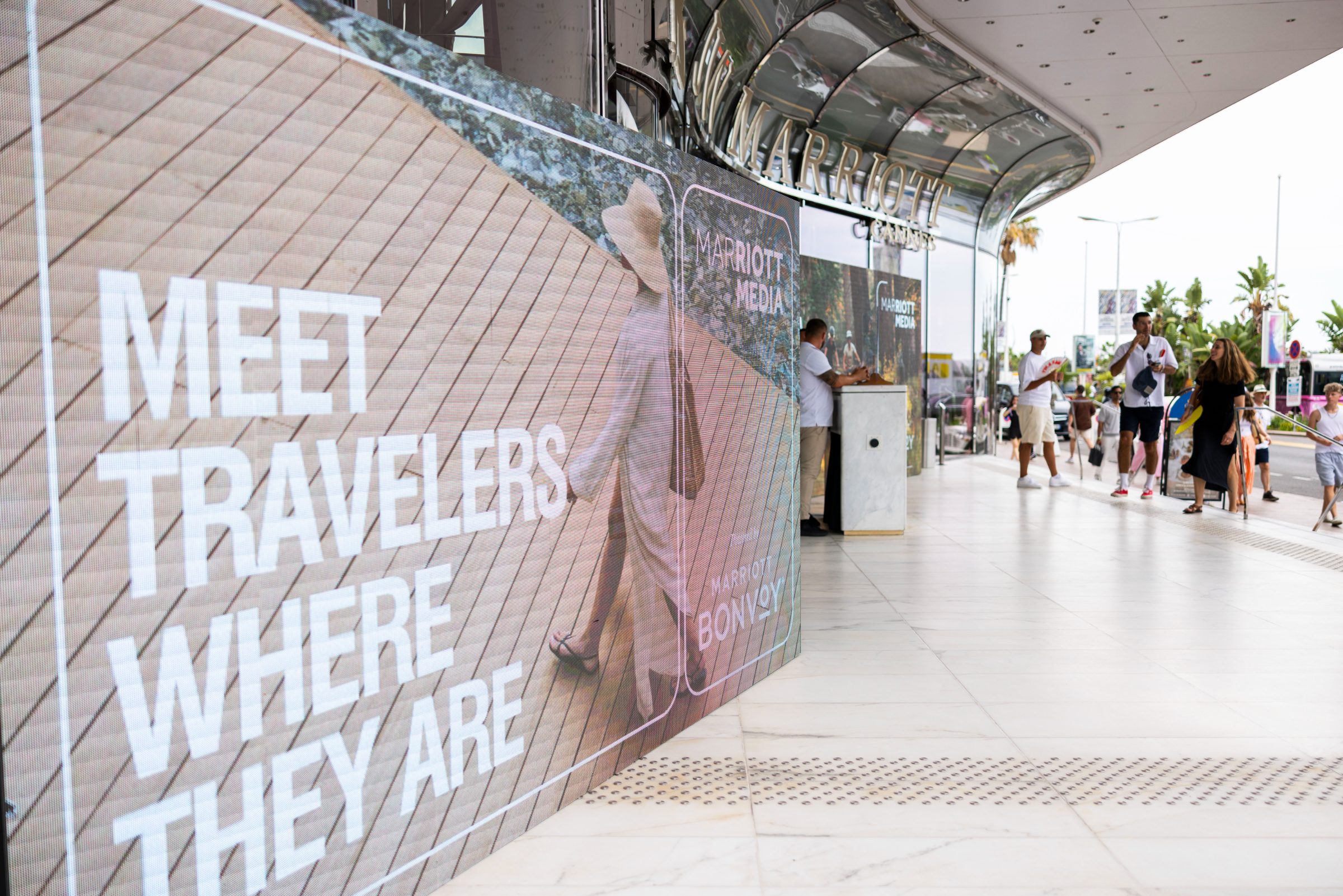 Meet travelers where they are campaign wall along the Croisette