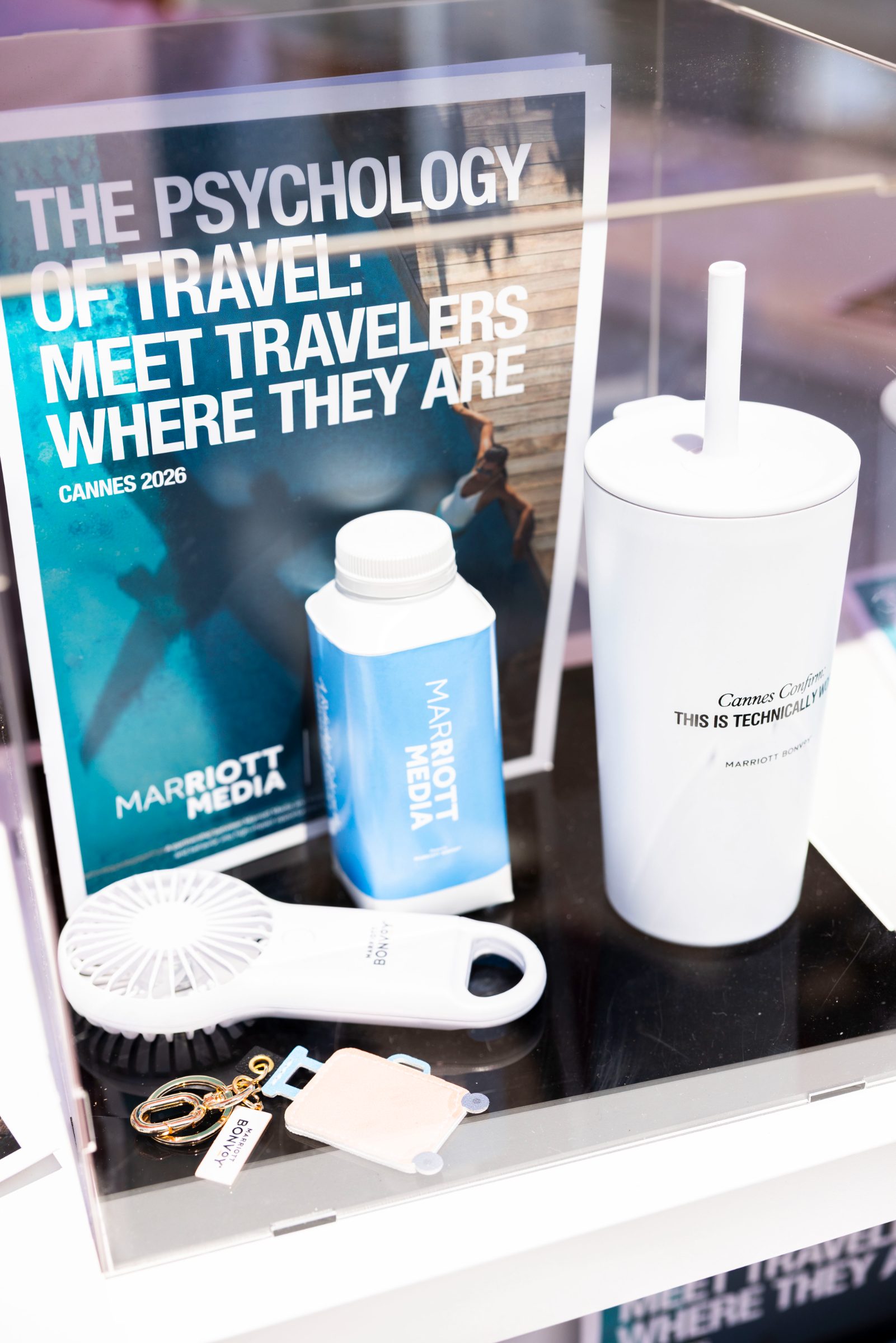 The printed Traveler Report styled with Marriott Media newsstand merchandise