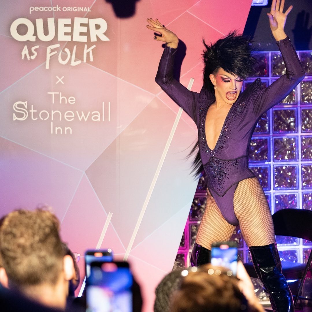 Drag performer onstage at the Peacock Queer As Folk premiere celebration at The Stonewall Inn