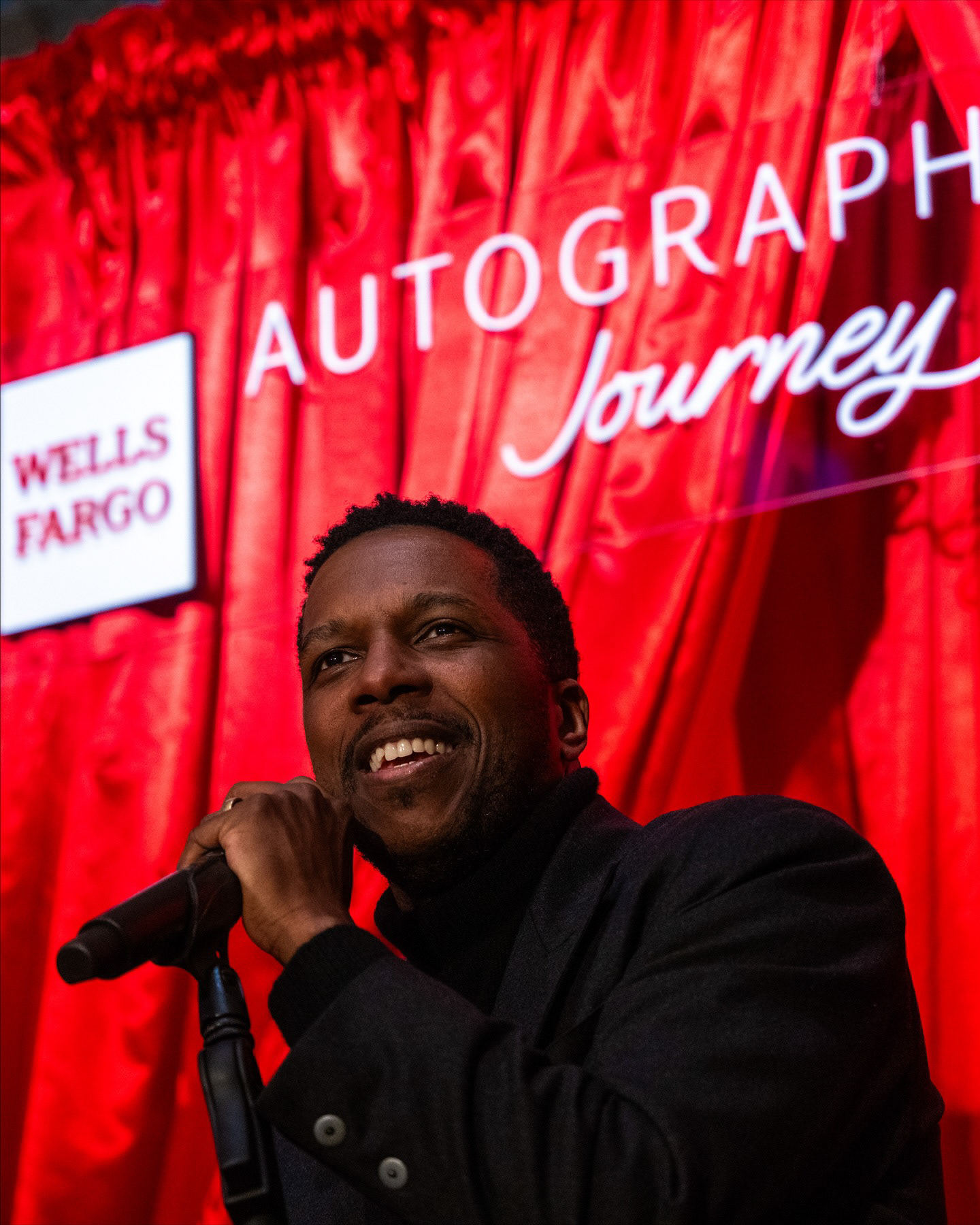 Leslie Odom Jr performing at the private Wells Fargo event