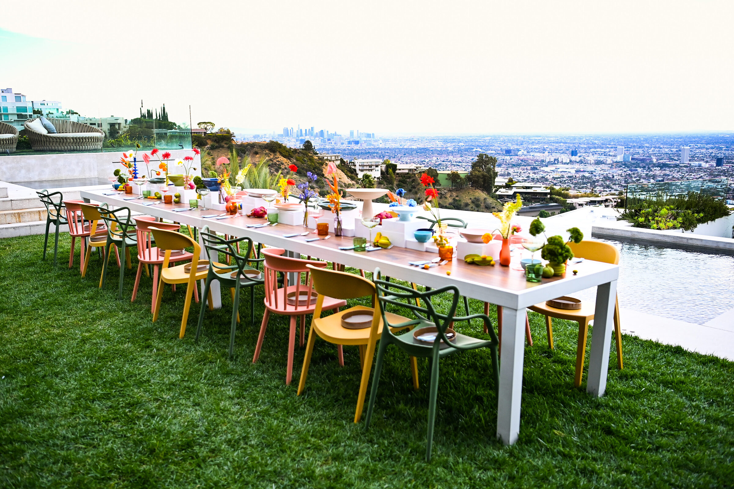 The colorful al fresco lunch table set against the Los Angeles skyline